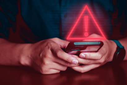 Picture of phone with emergency symbol